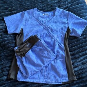 Wonder Wink Four Stretch Blue Scrub Set with black stretch sides and waist.